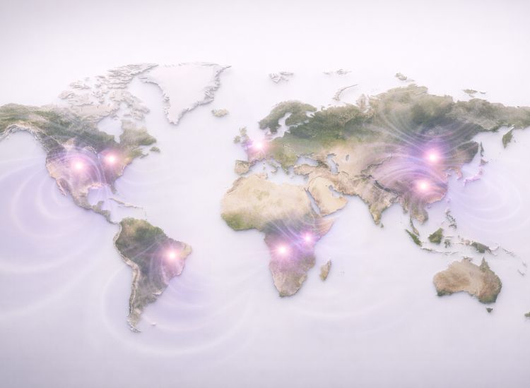 Stylized world map with glowing purple nodes and ripple effects showing global connectivity and data activity.